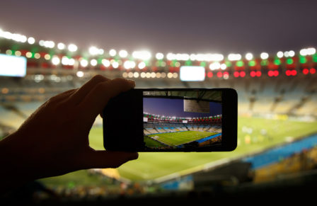 Smartphone,Photographing,Football,Game,On,The,Stadium.