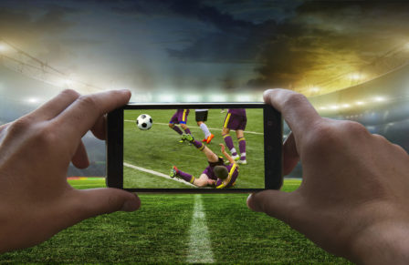 Football,Fan,Removes,The,Football,Game,On,Mobile,Phone