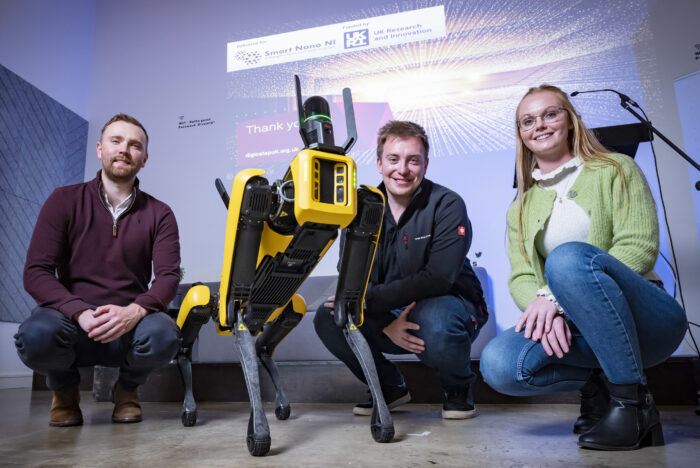 Brendan Lowry Digital Catapult Ruairi Telford Leica Geosystems and Jenny Gregg Vikela Armour with Spot the Dog and Leicas laser scanning module for robots.