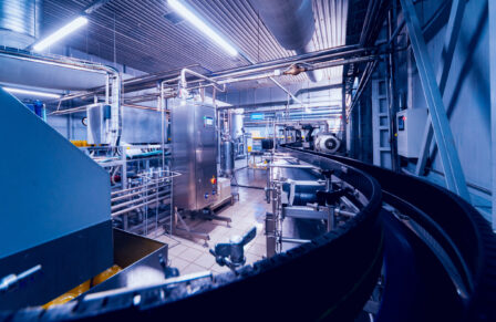 Beverage,Factory,Interior.,Conveyor,With,Bottles,For,Juice,Or,Water.