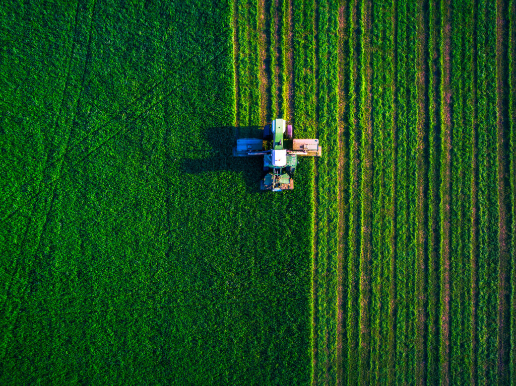 Tractor,Mowing,Green,Field,,Aerial,View