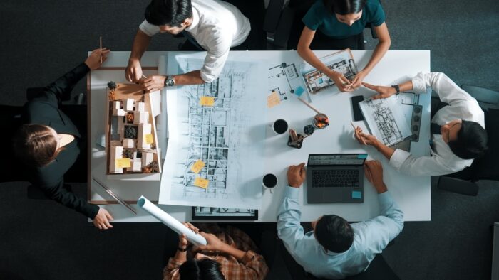 Top,Aerial,View,Of,Project,Manager,Or,Civil,Engineer,Writing